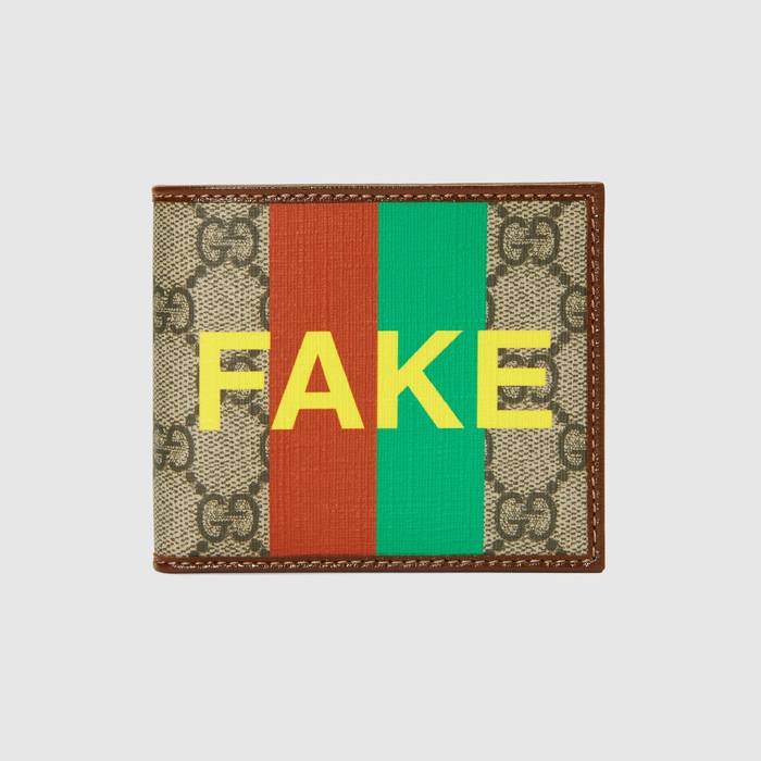 유럽직배송 구찌 GUCCI Gucci &#039;Fake/Not&#039; print billfold wallet 6361662GCAG8280