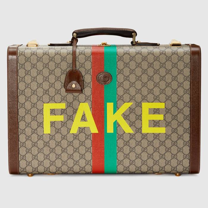 유럽직배송 구찌 GUCCI Gucci &#039;Fake/Not&#039; print medium suitcase 6116422GCAG8280
