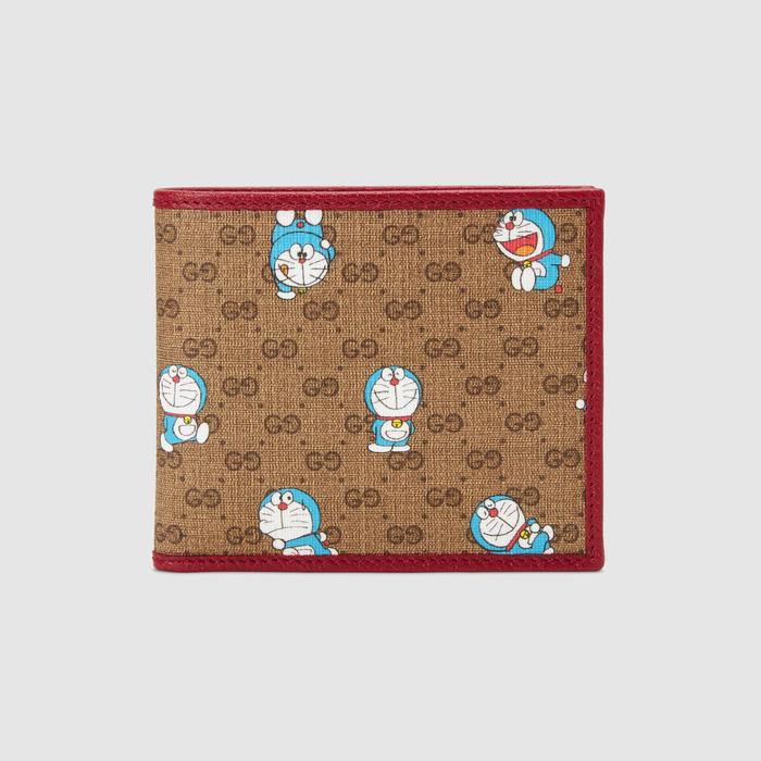 유럽직배송 구찌 GUCCI Gucci - Doraemon x Gucci bi-fold wallet 6478022TUBG8580