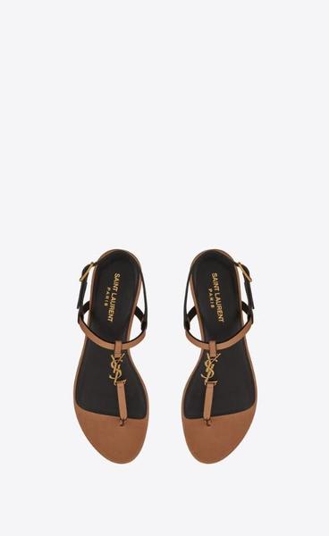 유럽직배송 입생로랑 카산드라 플랫 샌들 SAINT LAURENT cassandra flat sandals in vegetable-tanned leather with bronze-tone monogram 659817AAAM77052